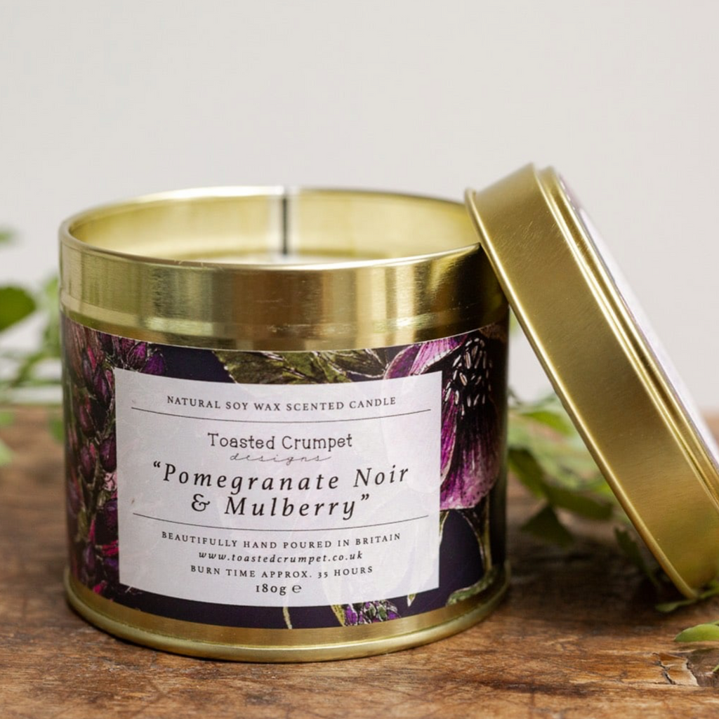 toasted crumpet pomegranate noir and mulberry gold candle tin