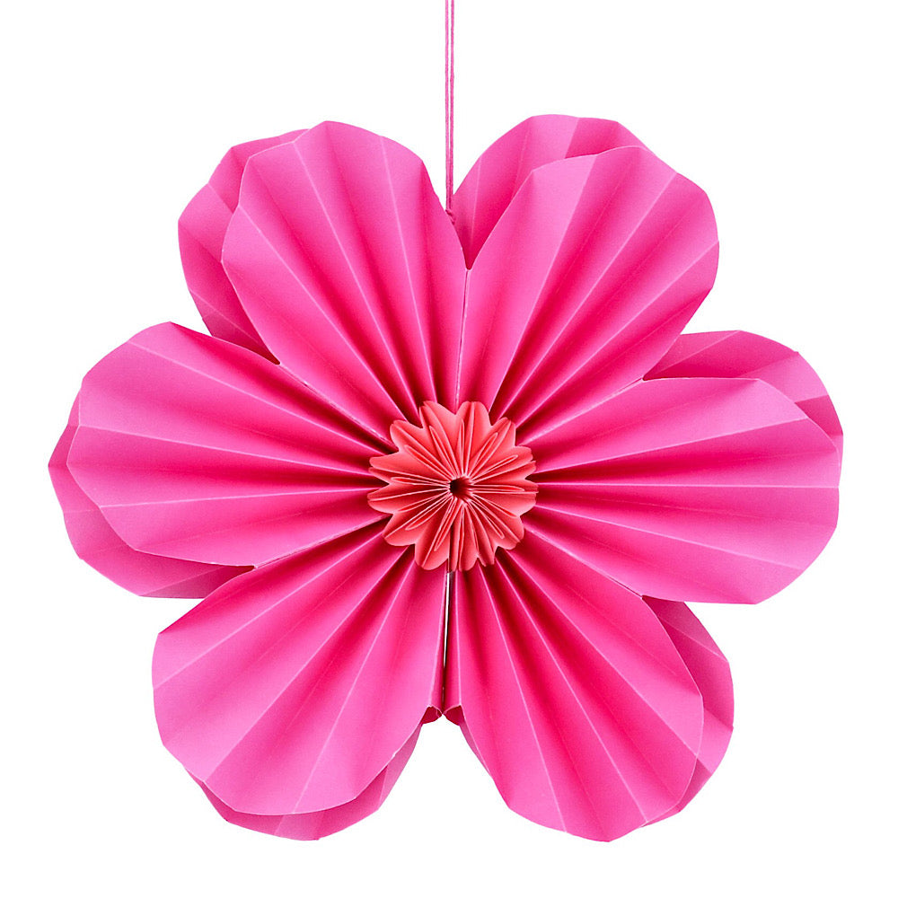 large pink hanging paper flower